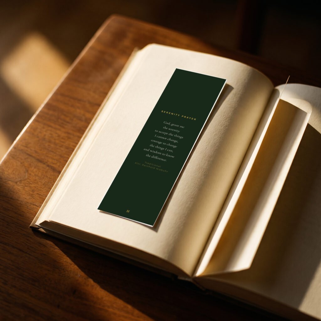 Green and gold recovery bookmark, dark background, in a book